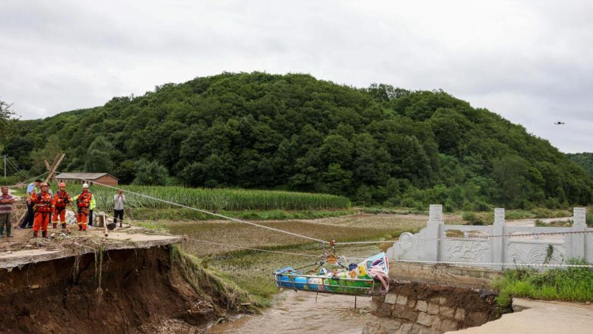 Çin'de sel felaketi: 14 meyyit, 1 kayıp